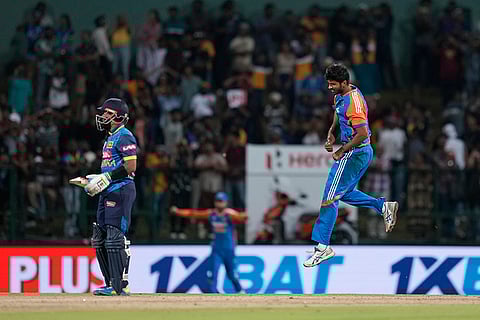 Washington Sundar celebrates the wicket of Kusal Perera taken in the super